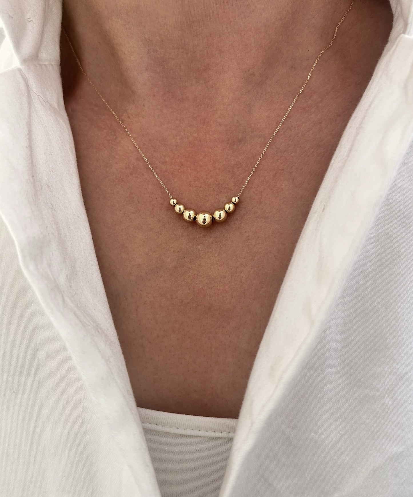 Collar Sferas Oro